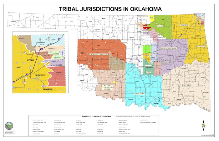 Map of Oklahoma including cities, counties, state highways, and interstates. In colors are the 37 federally recognized tribes and their land in Oklahoma. On the left is an inset map of the far northeast corner of Oklahoma.